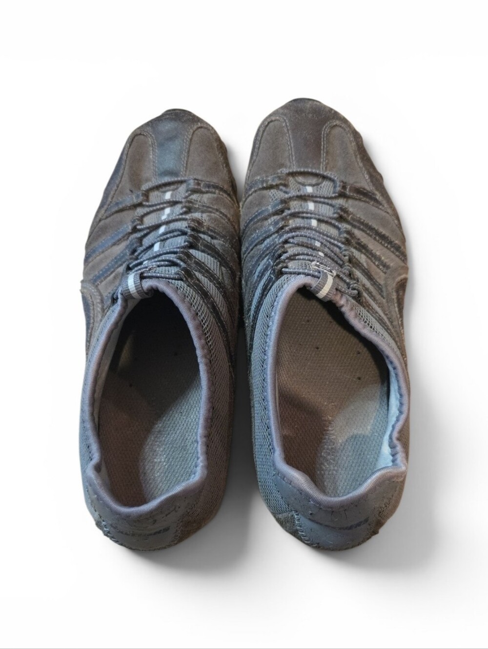 Sketchers Tennis Shoe.  Gray With Purple Trim.  Lots Of Tred Left. Slip On.